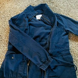 This is very fashionable Old Navy jacket. It’s a XS and a navy blue color.